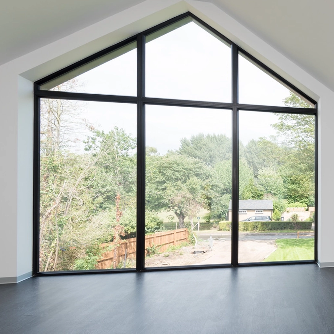 Modern property featuring large fixed architectural impact windows